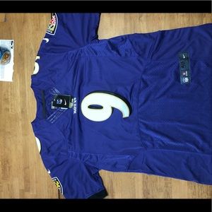 Patched nike ravens Tucker jersey.